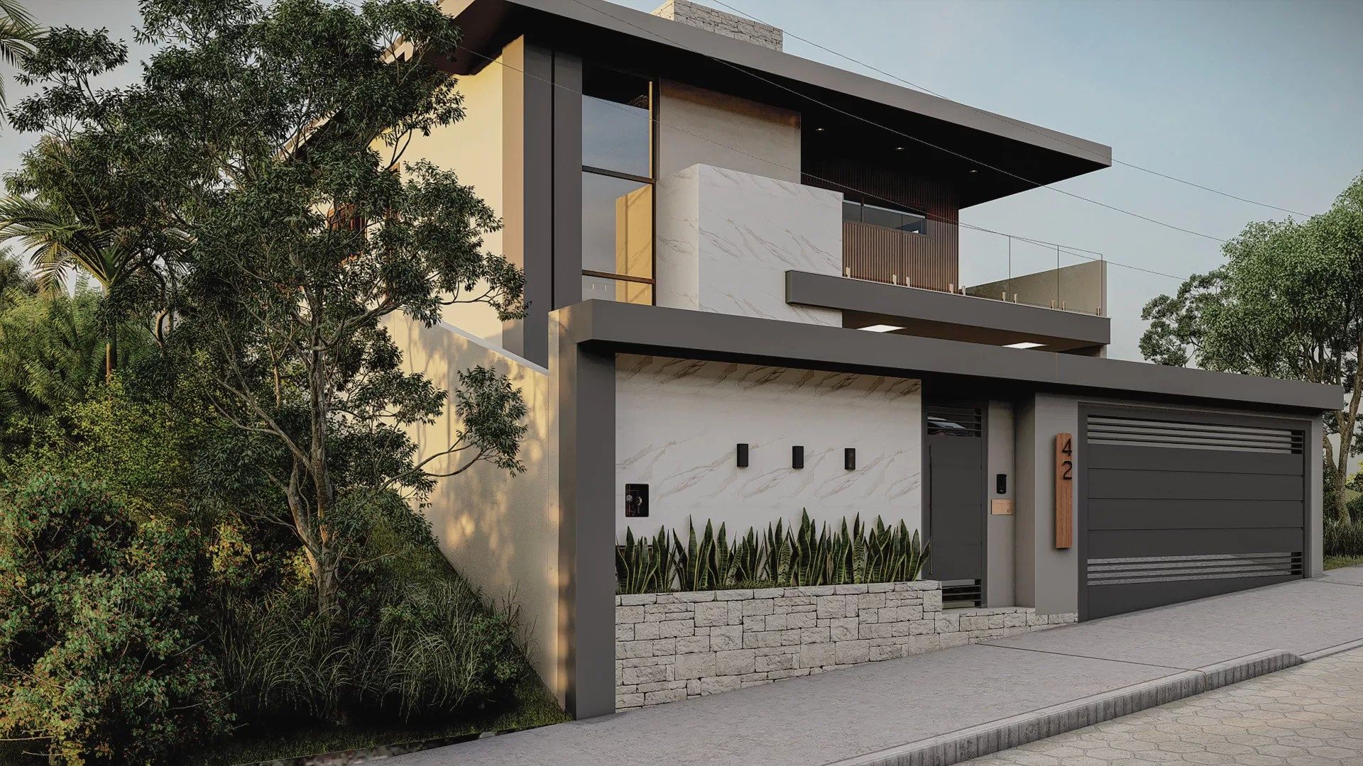 Muro frontal com pedras naturais e torre de caixa d'água revestida