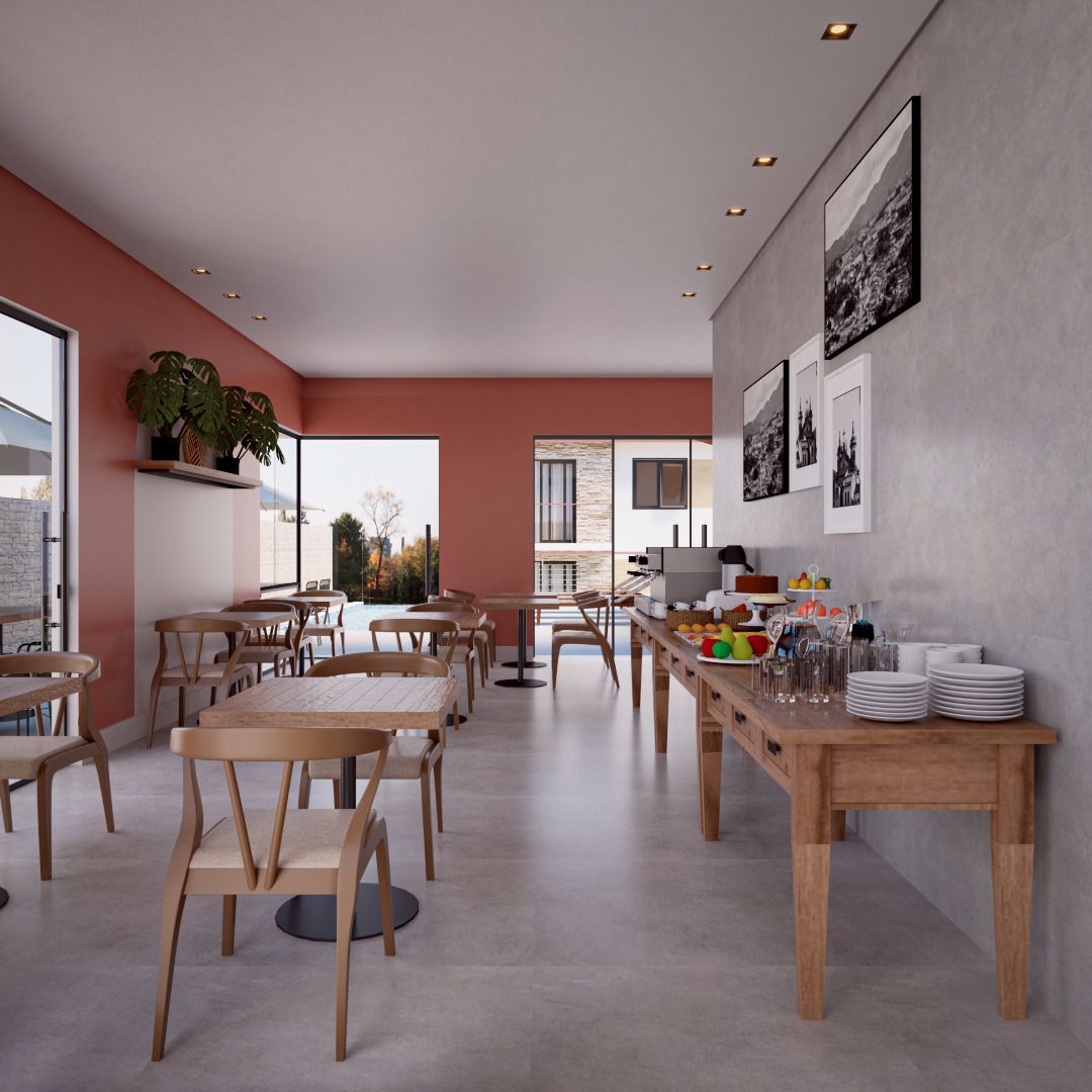 Área de café da manhã com mesa comunitária e vista para o jardim